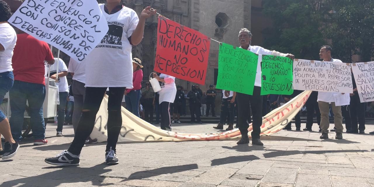 Realizan comerciantes marcha hacia la CEDH